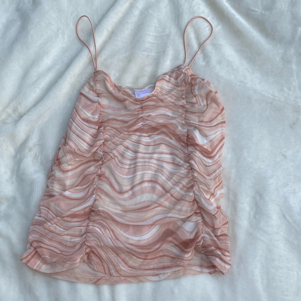 Orange sickle, swirly tank top shirt messy but not see-through